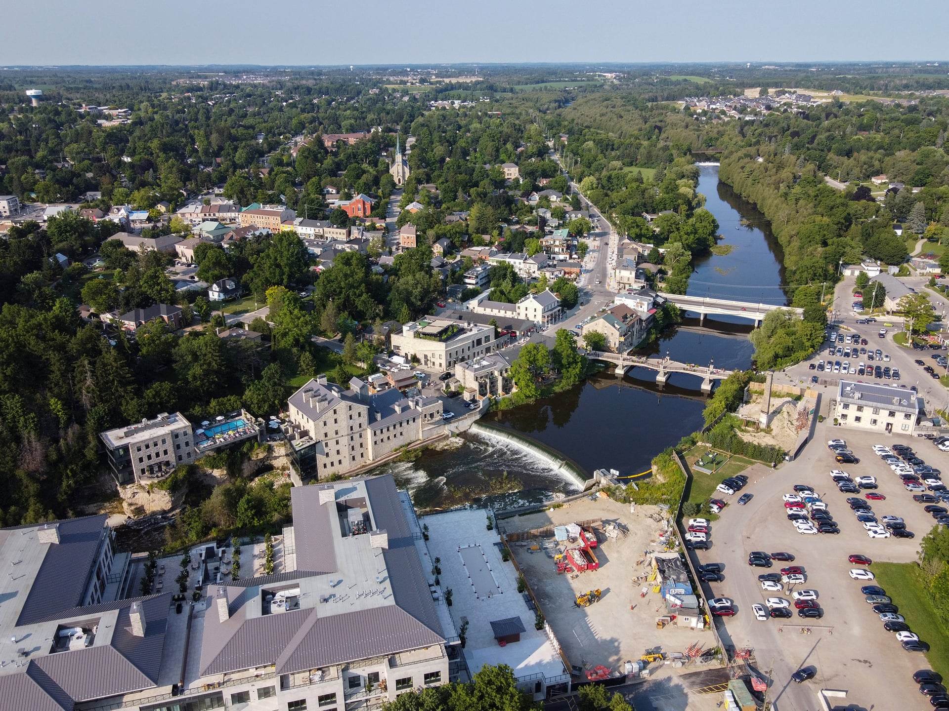Aerial view of Elora: the Grand River, the stone mill and the waterfall below the village centre.