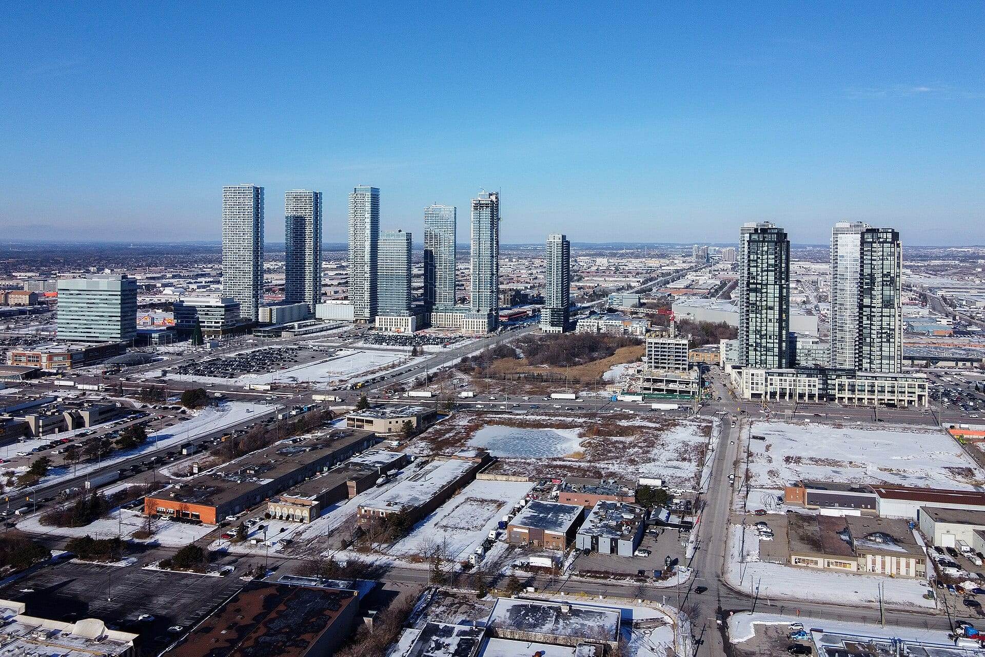 Aerial view of the new condo towers of the Vaughan Metropolitan Centre on a clear winter day.