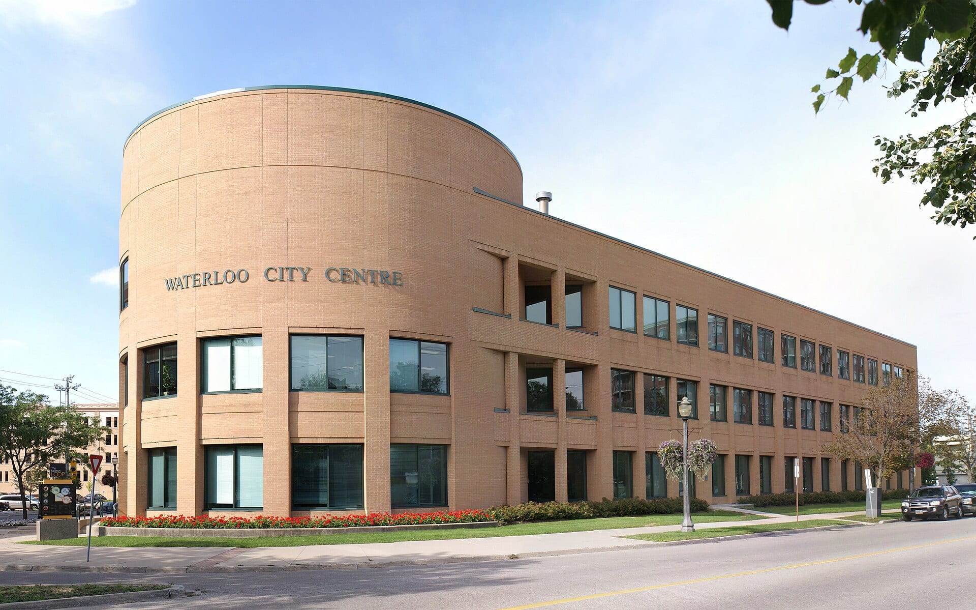 The curved, sand-coloured Waterloo City Centre building that houses Waterloo City Hall.